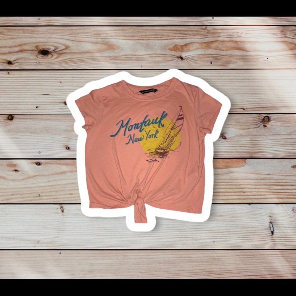 Light Pink Graphic Tee with Tie Knot at the bottom